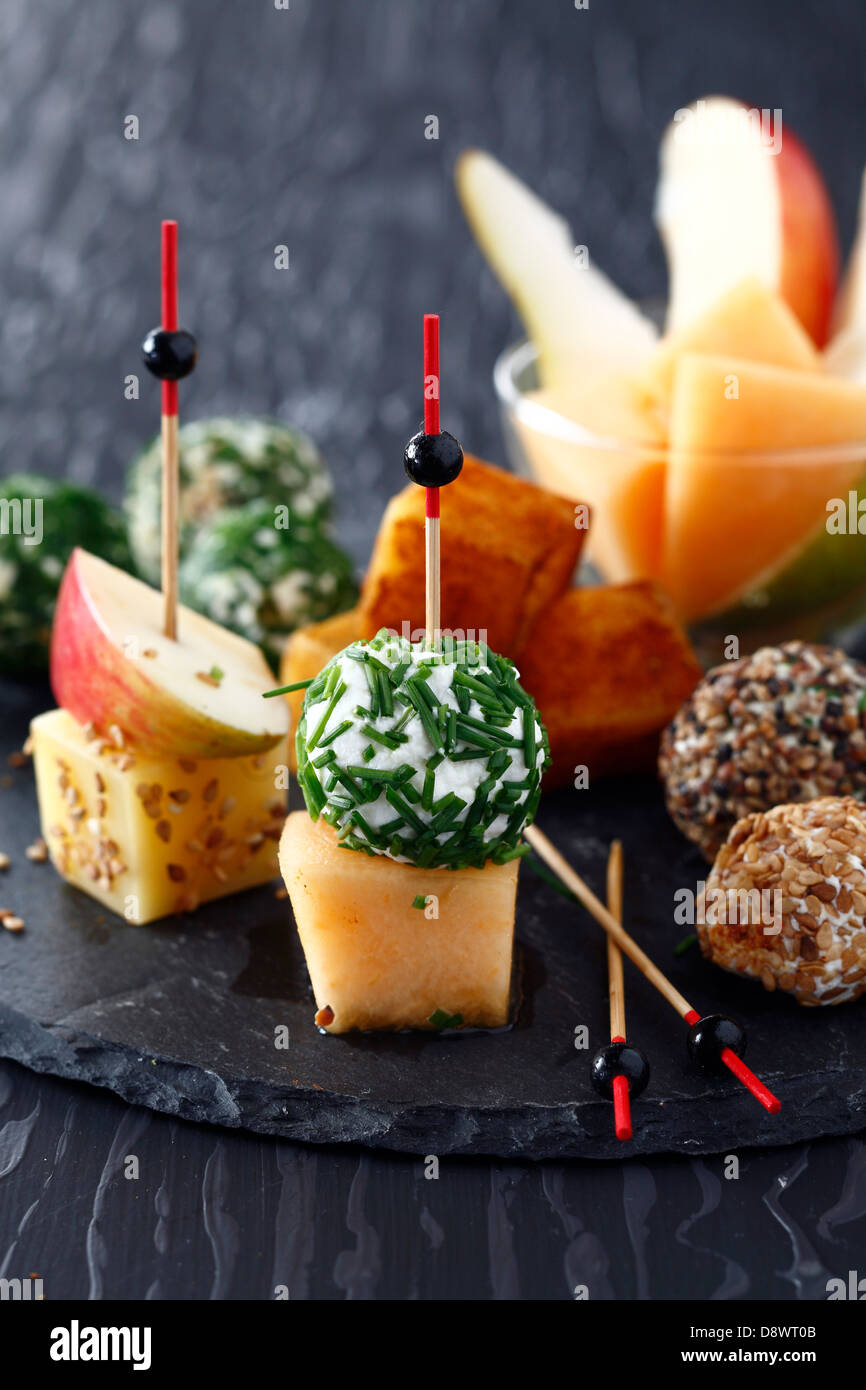Cheese balls coated in herbs and spices Stock Photo