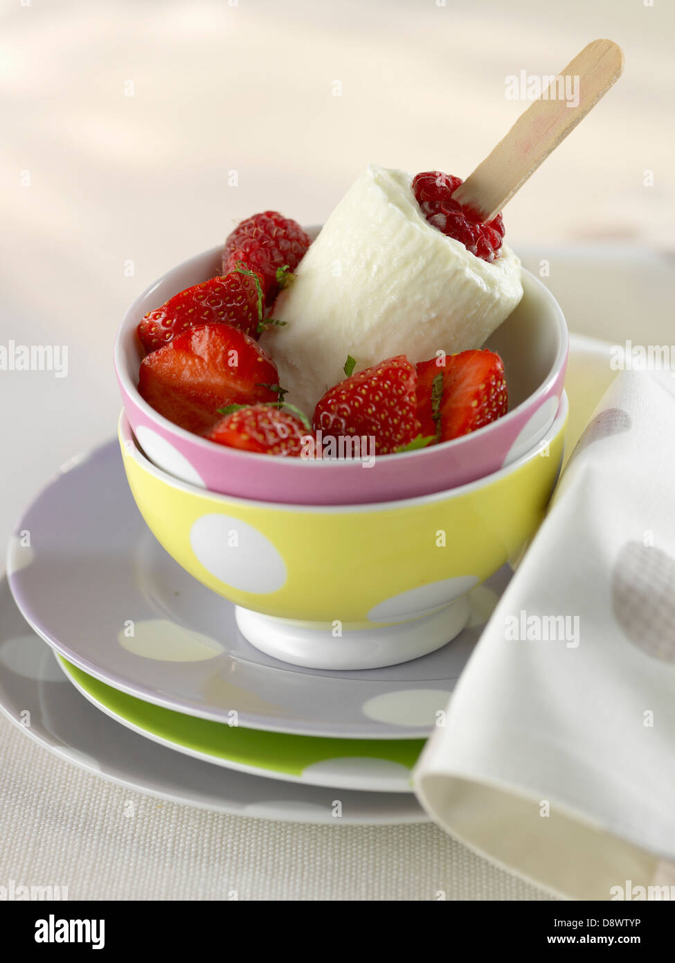 Raspberry Petit-suisse ice cream with strawberries Stock Photo