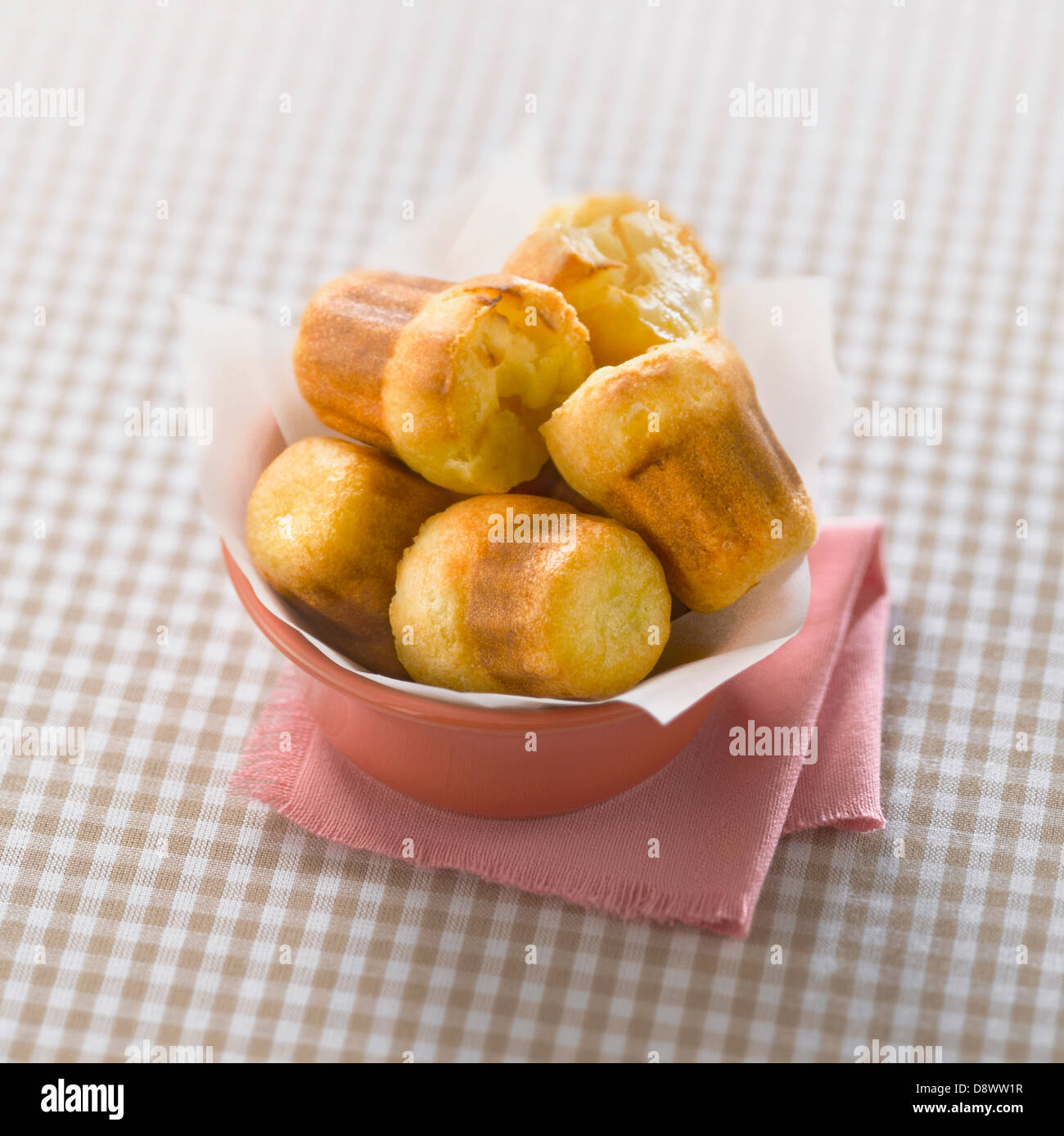 Apple and camembert Cannelés Stock Photo