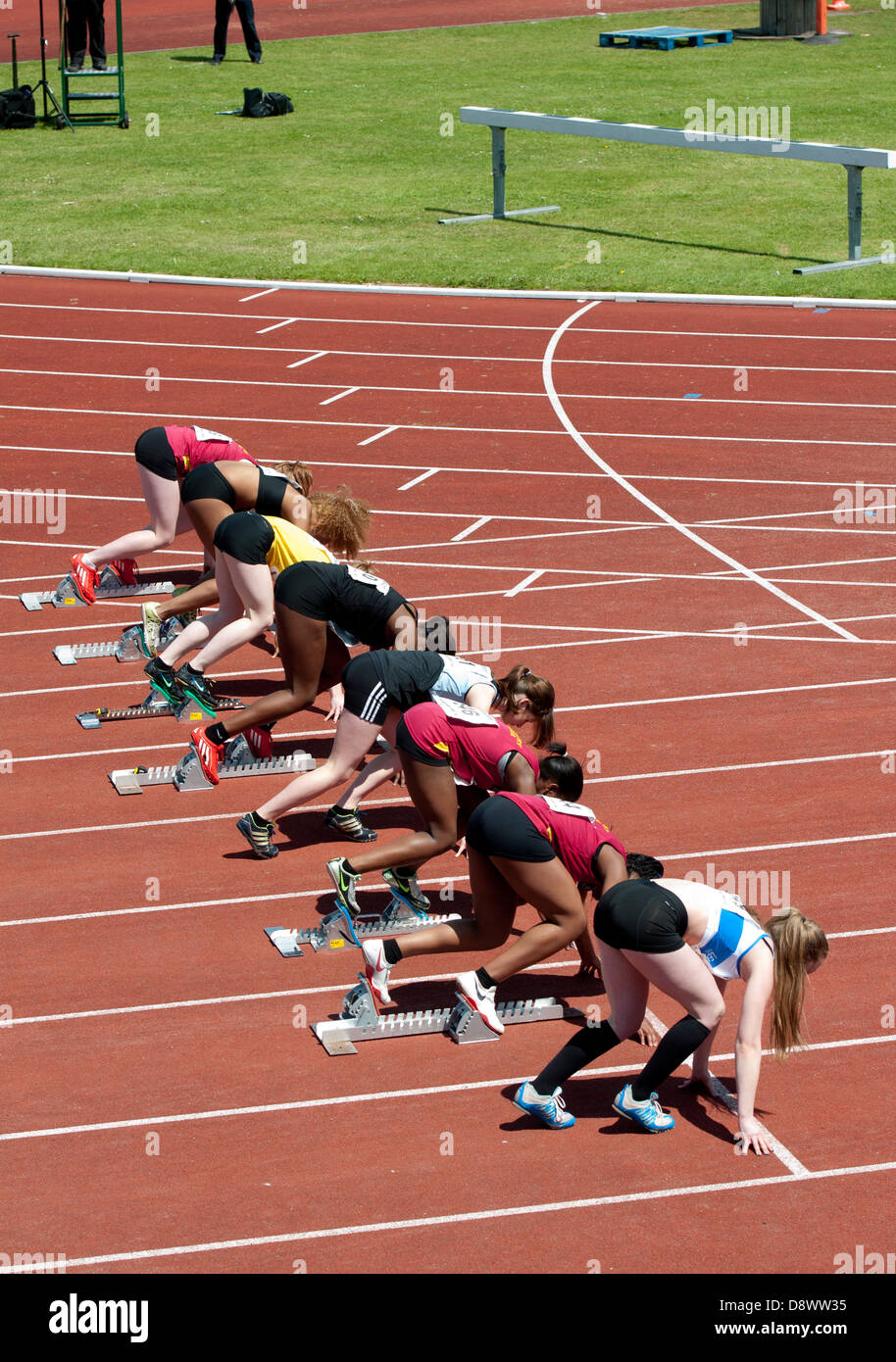 Teenage girls running track hi-res stock photography and images