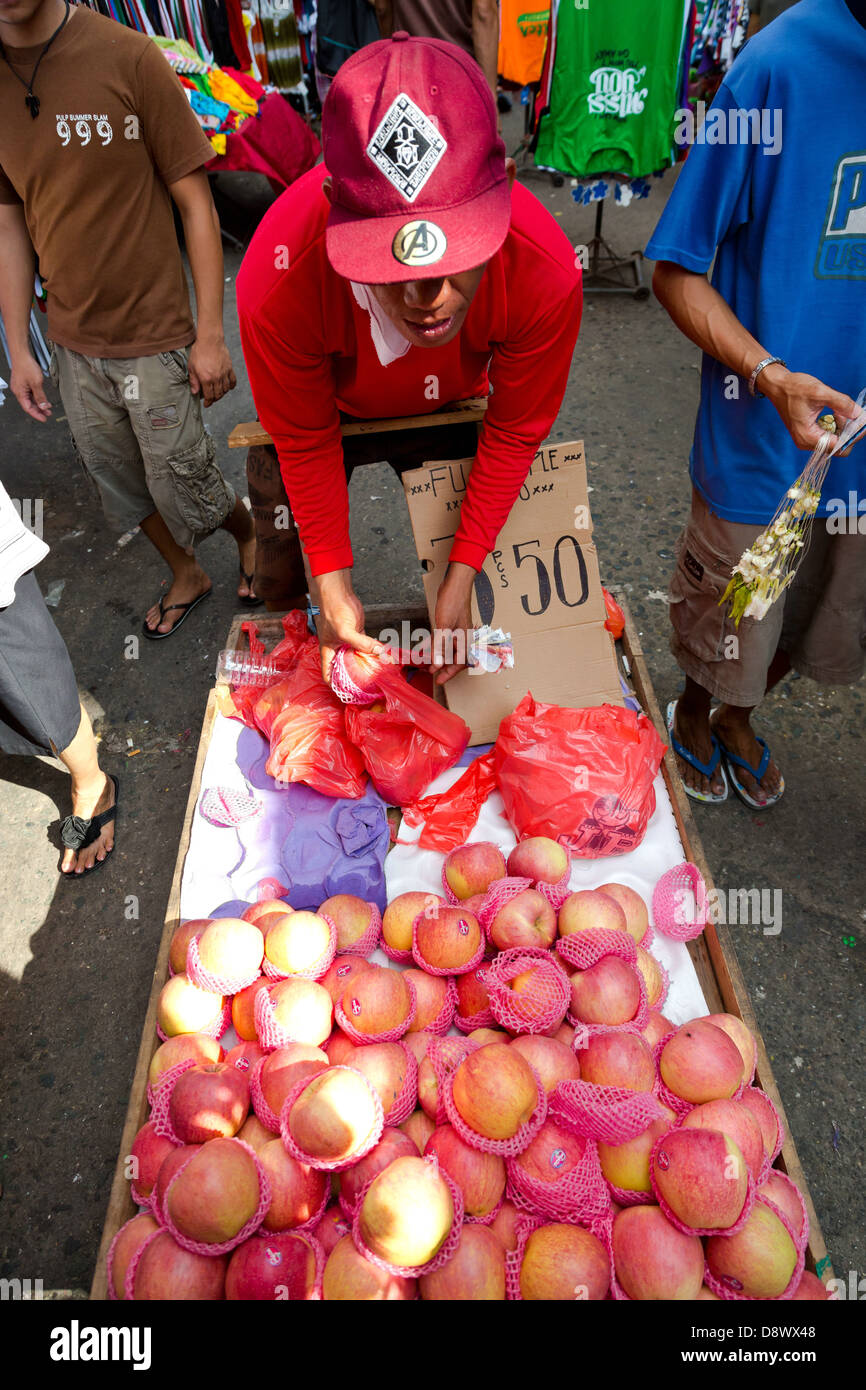 Fruit Seller on the Divisoria Market in Manila, Philippines Stock Photo