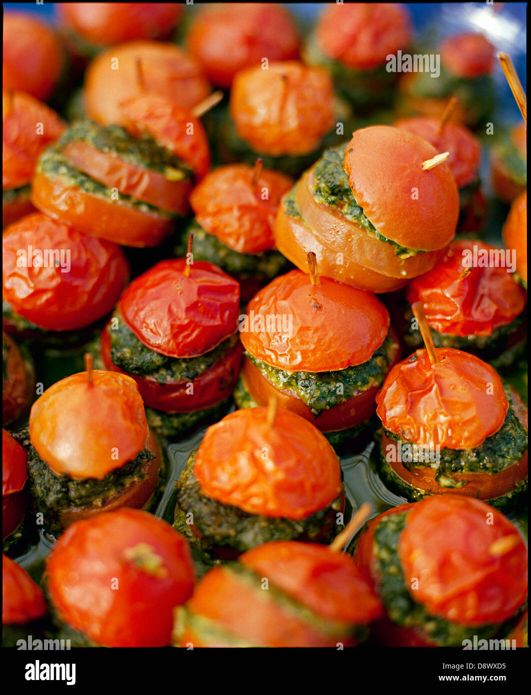 Stuffed Tomatoes in a Marinade. Stock Photo