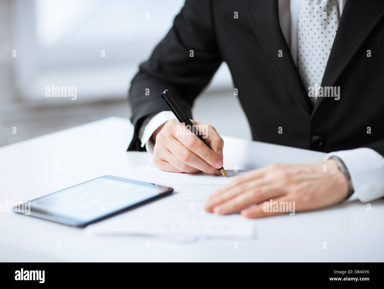 Man writing in tablet hi-res stock photography and images - Alamy