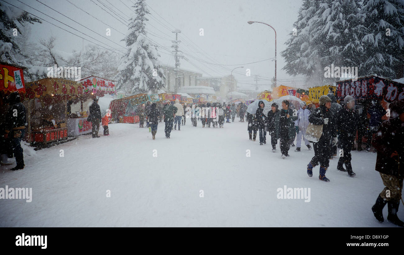 Heavy Snow Fall at Yuzawa Inukko Winter Festival. There were many food and game stalls and a huge crowd Stock Photo