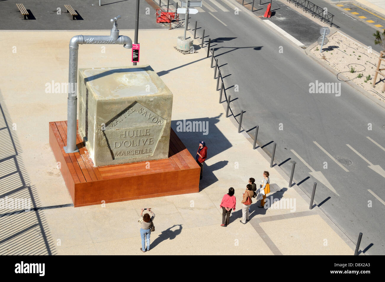 Tourists & Giant Olive Oil Soap Art Installation or Savon de Marseille  Public Sculpture or Street Art on La Joliette Waterfront Marseille France  Stock Photo - Alamy