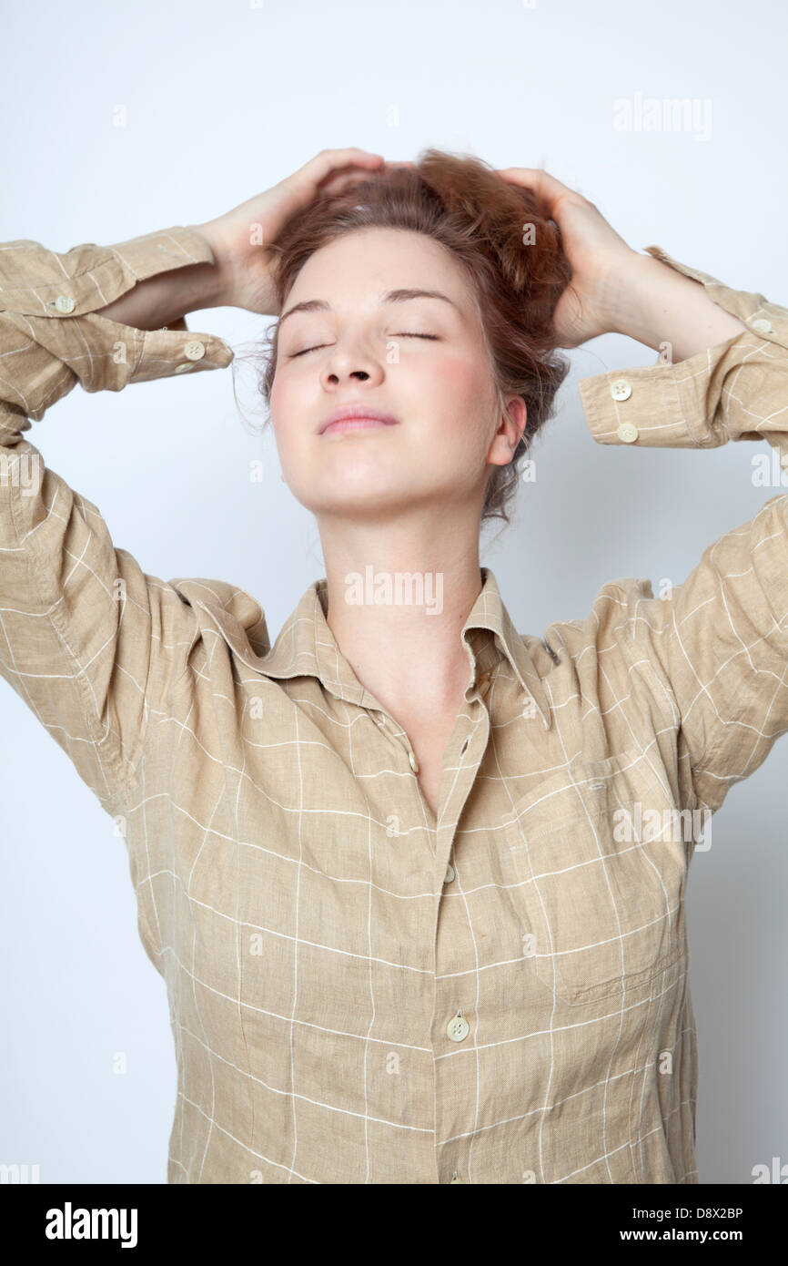 Strawberry Blond Holding Hair Up Stock Photo