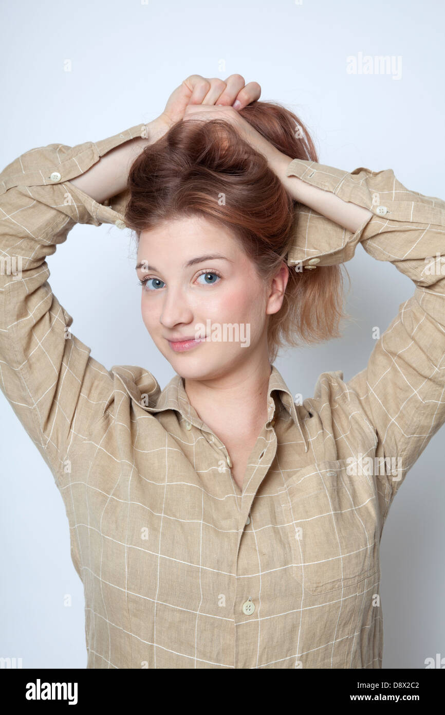 Strawberry Blond Holding Hair Up Stock Photo