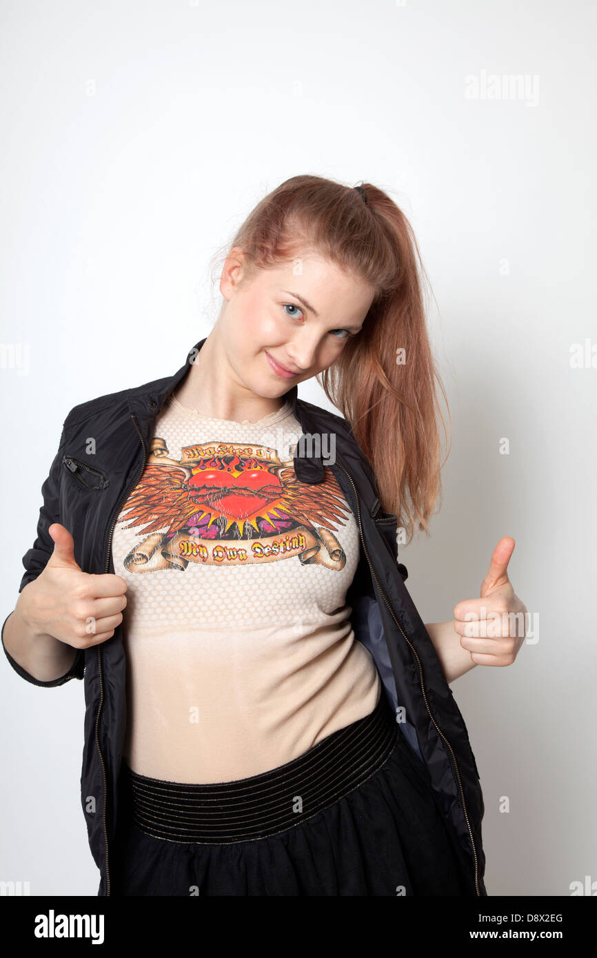 Strawberry Blond Rock Chick With Thumbs Up Stock Photo