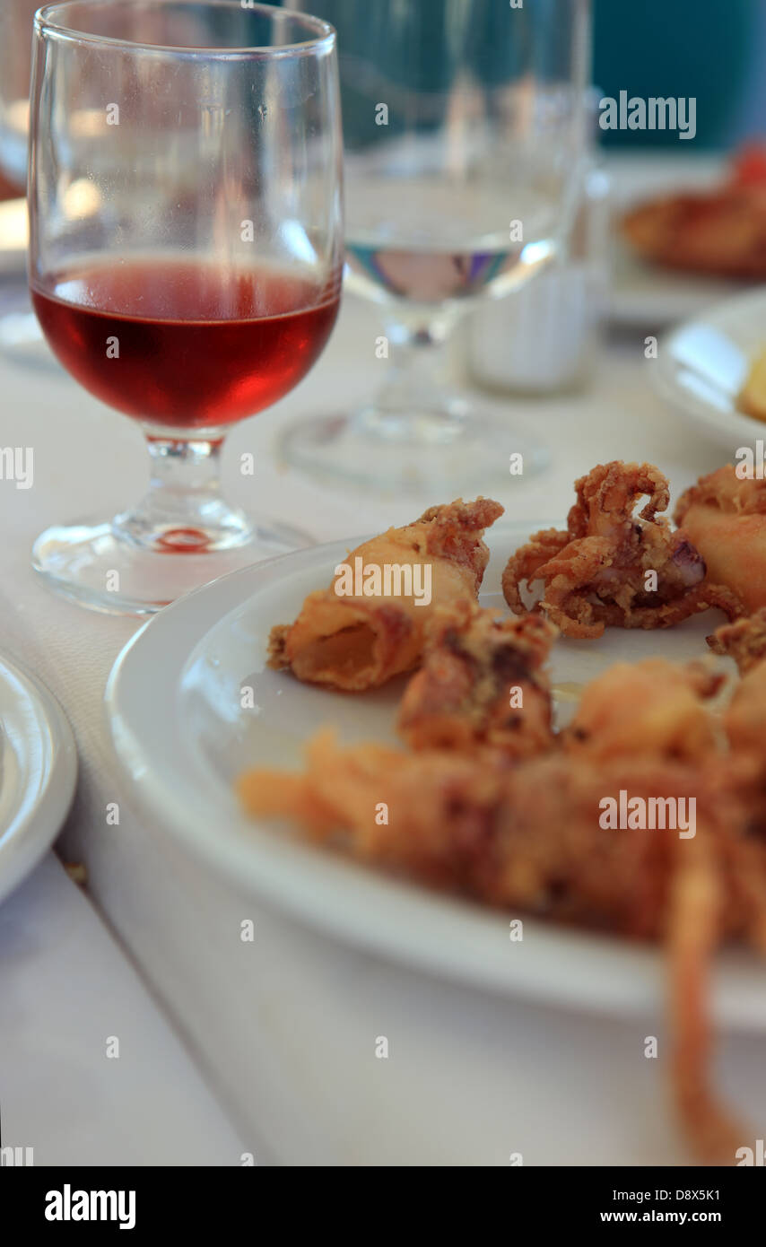 Plate of deep fried squid or Calamari in a Greek restaurant Stock Photo