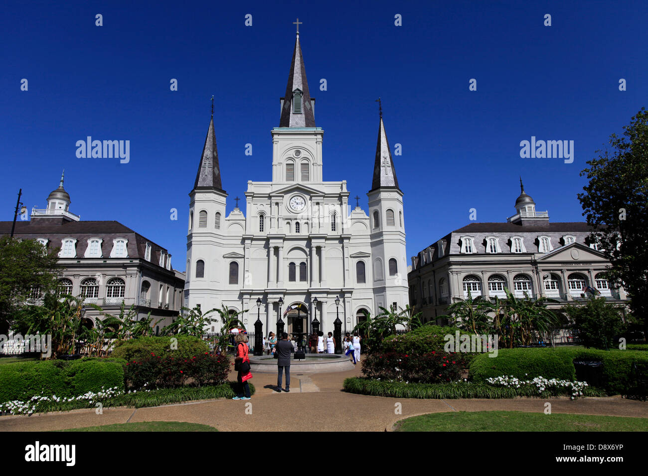The Jackson Square is the history-most pregnant place in Louisiana. Left in the background the Cabildo. Formerly the house of the Spanish colonial-administration. In center the St. Louis Cathedrale and at the right the Presbytère.  Photo: Klaus Nowottnick Stock Photo