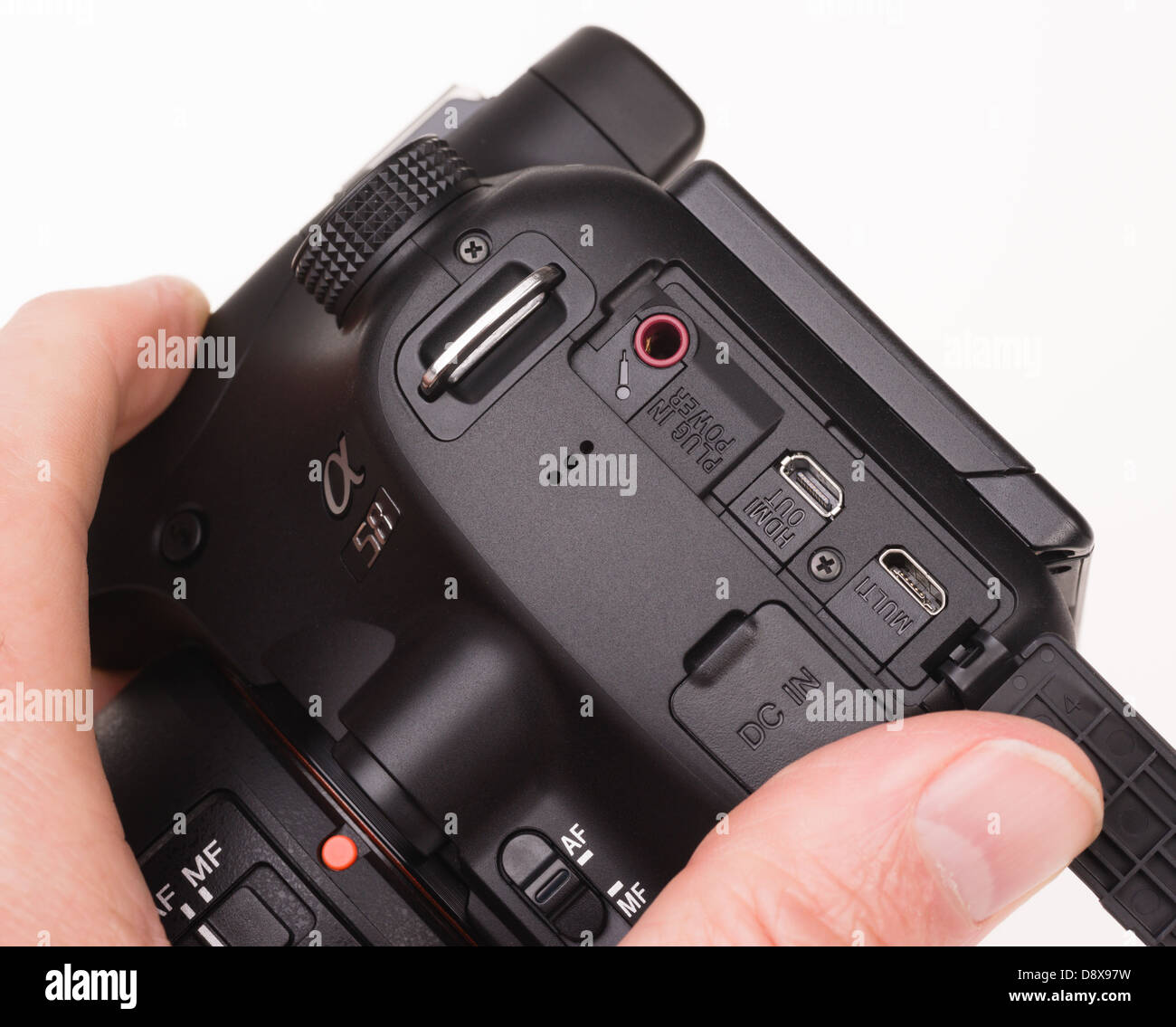 Sony Alpha 58 digital system camera - micro USB and HDMI interface, microphone socket. Stock Photo