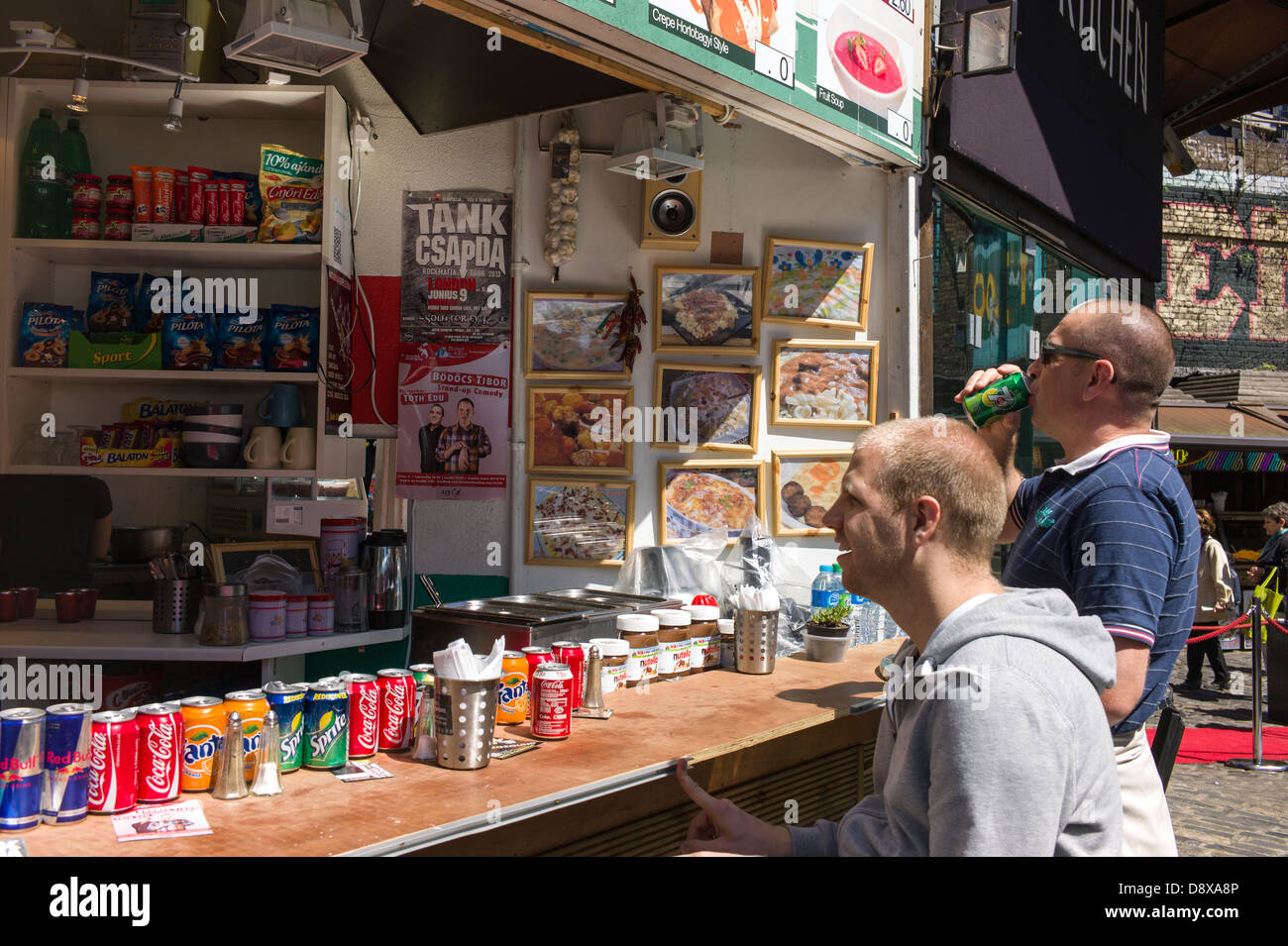 London UK, Camden Town, Camden Market, food, snack, bar, stall, tourist buying food, drinks, Stock Photo