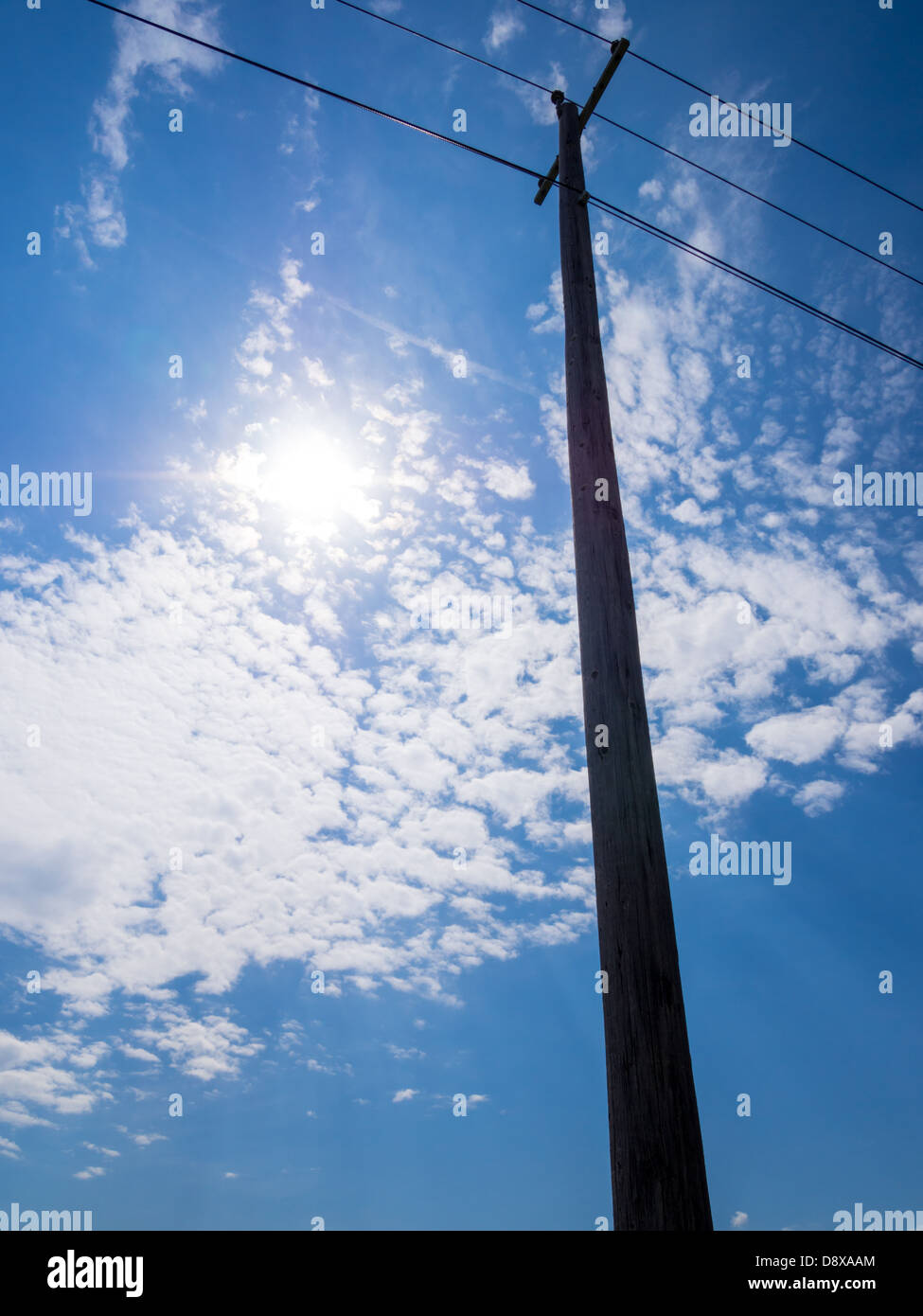 power lines against blue sky Stock Photo - Alamy
