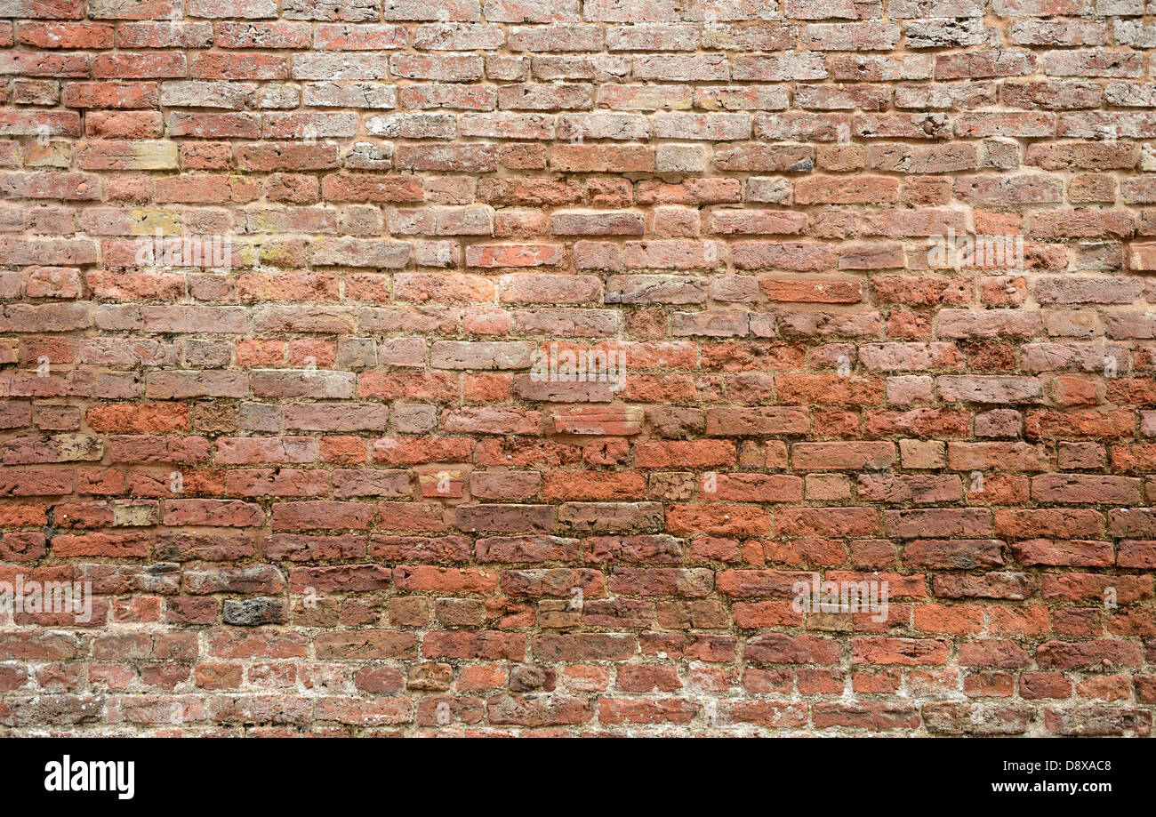 very old brick wall brick faces damaged with time background texture ...