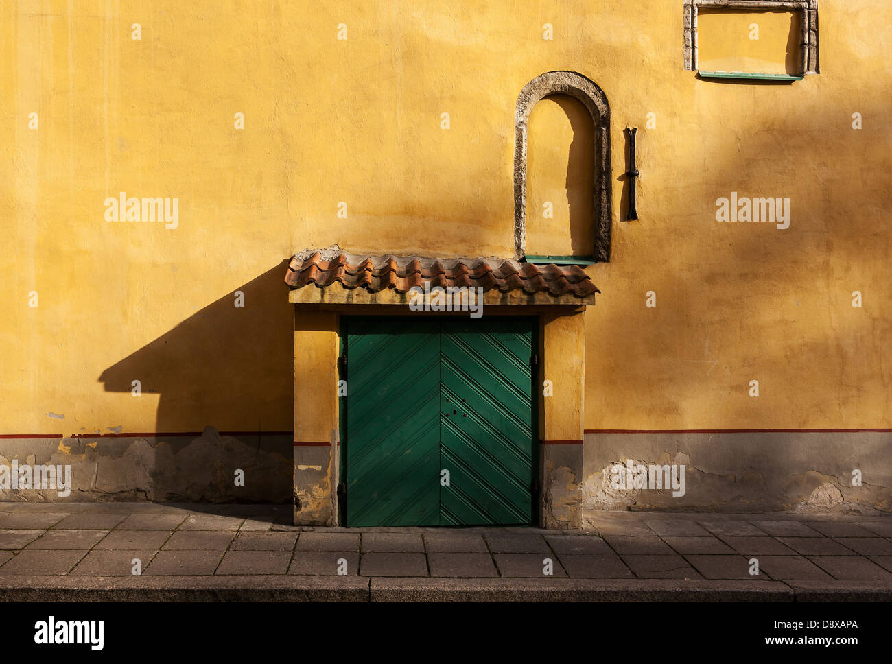 Light and shadows on a wall in the historic city of Tallinn , Estonia Stock Photo
