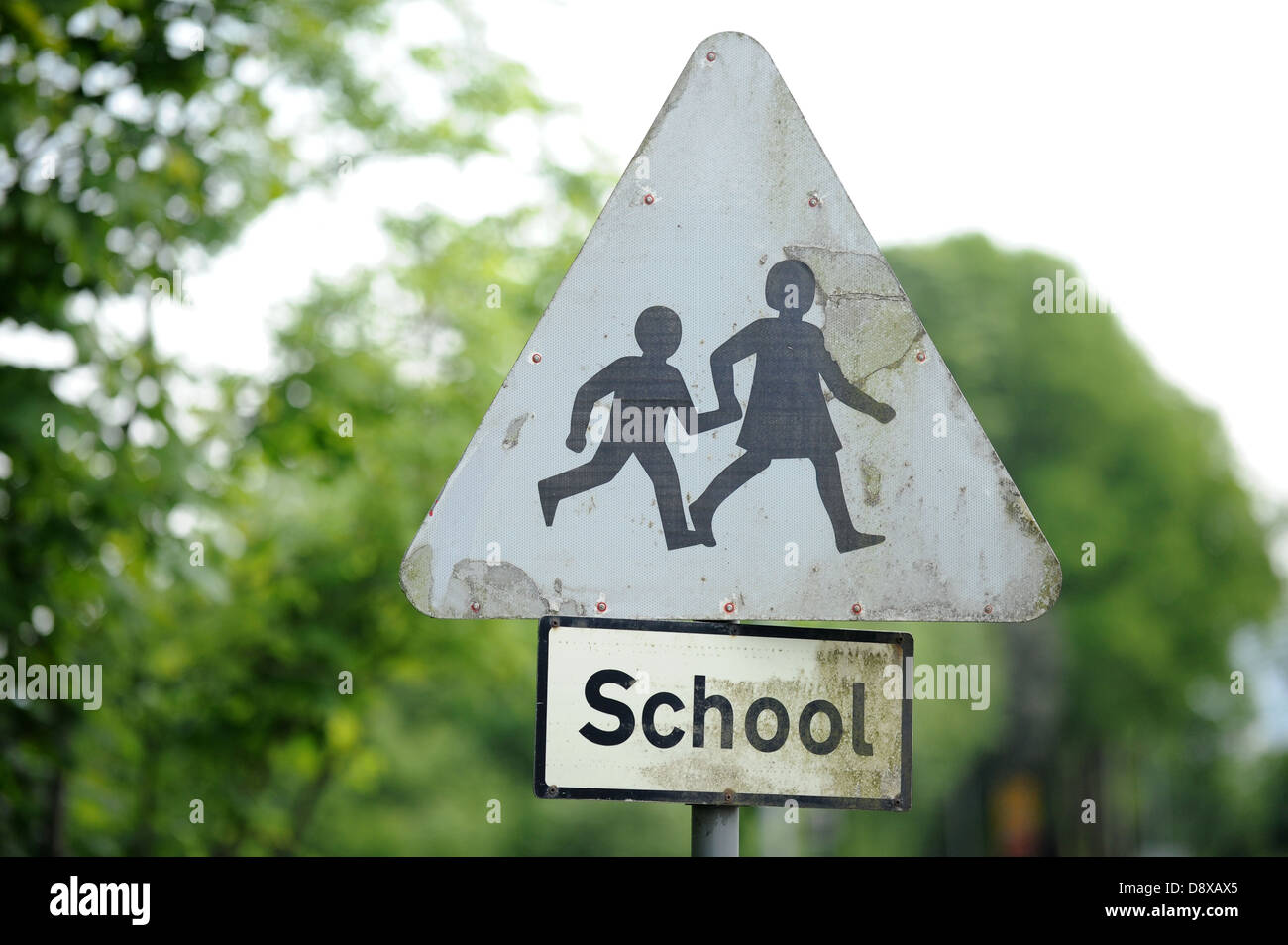 Worn out school sign. Stock Photo