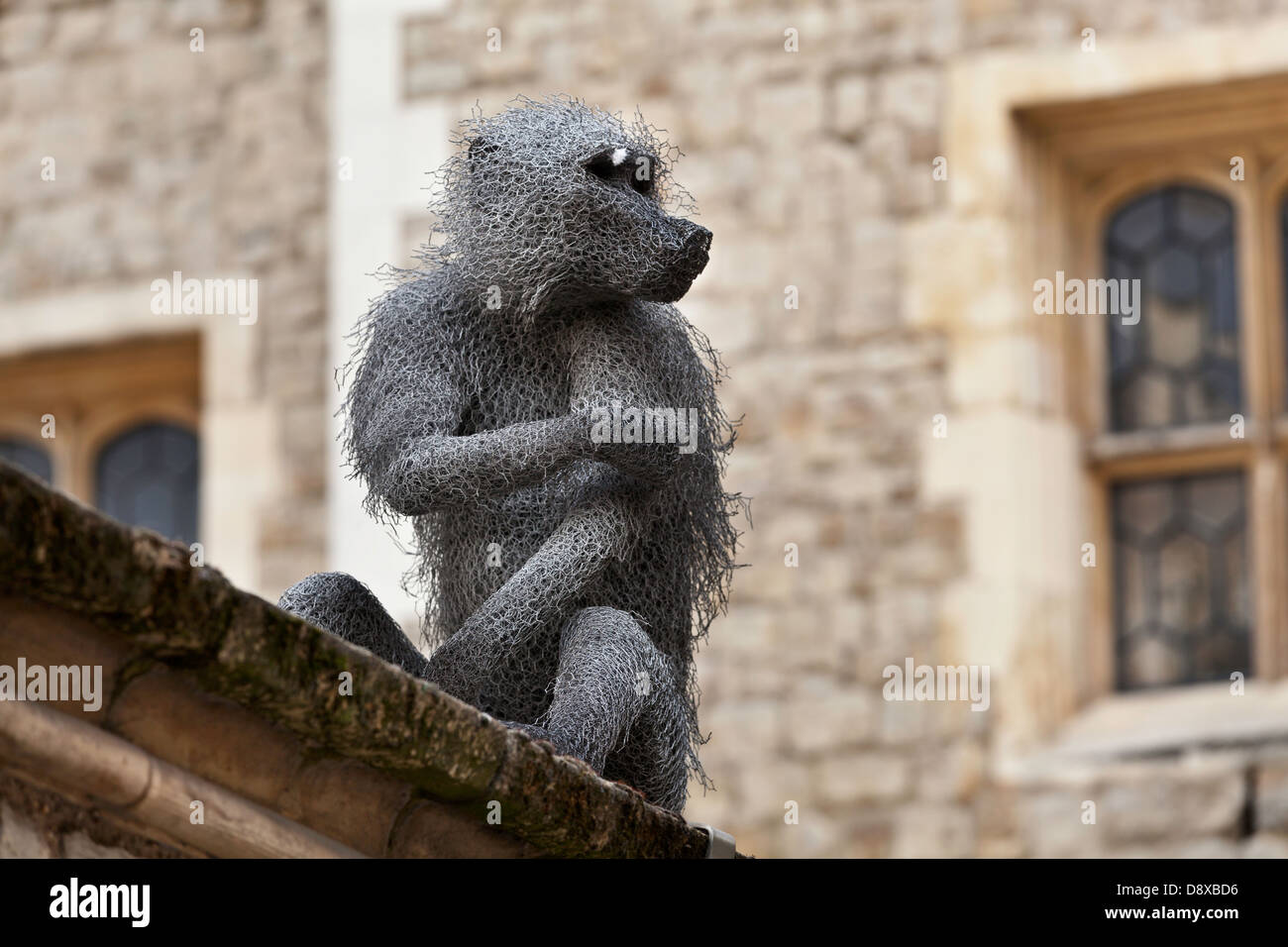 Monkey on a roof at the Tower of London in London as part of a display