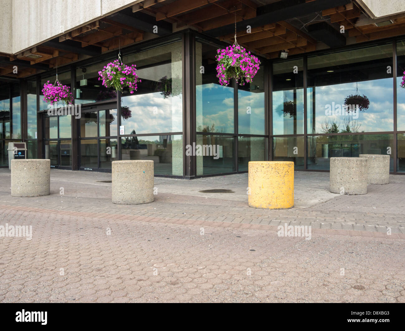 concrete posts and hanging baskets Stock Photo Alamy