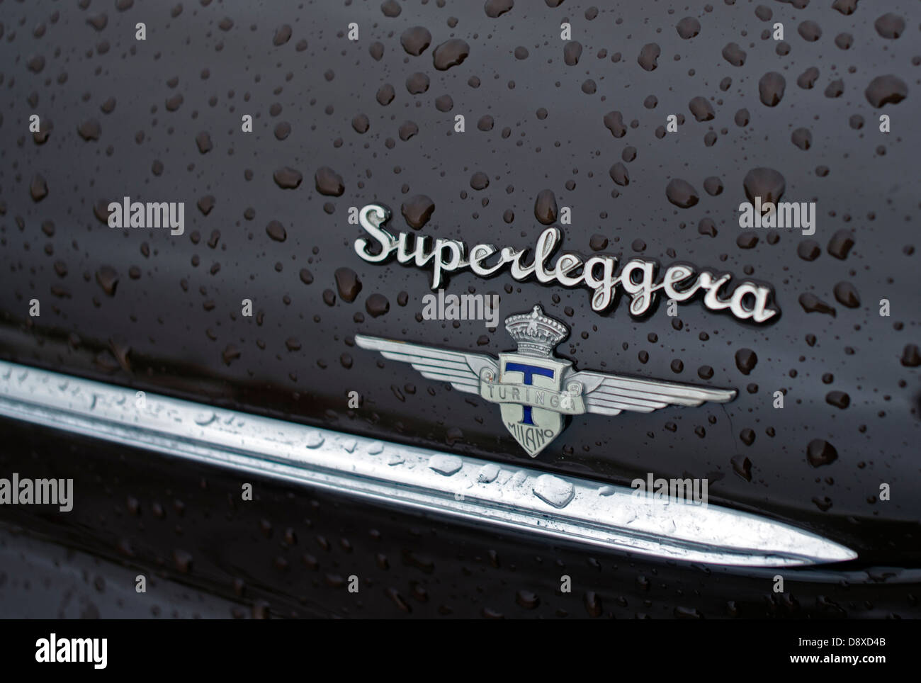 A logo of an Old Lancia with raindrops Stock Photo