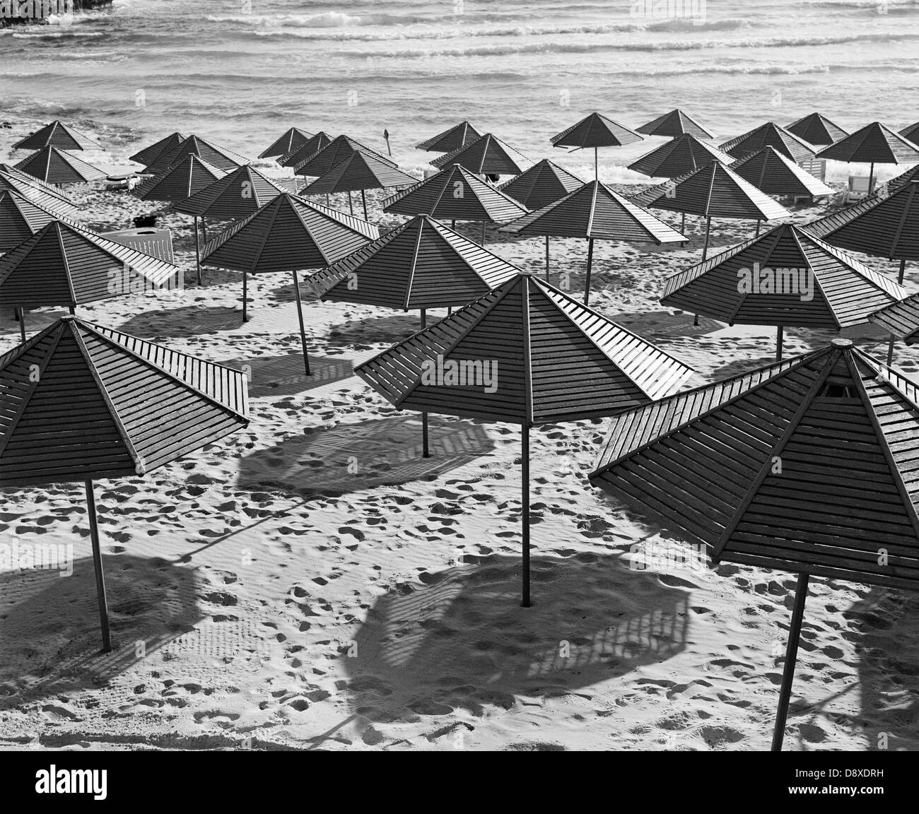 Canopies on beach (B&W Stock Photo Alamy