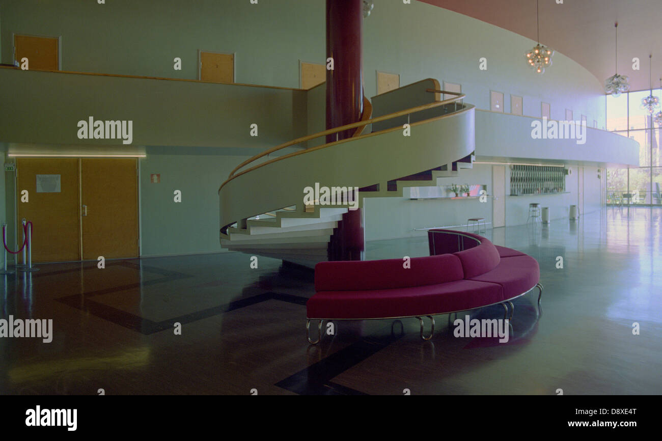 Spiral staircase by sofa Stock Photo Alamy