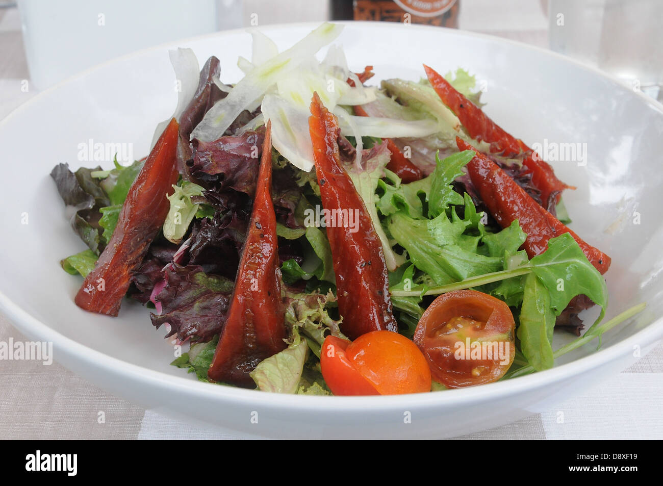 Candied Salmon Salad in a white bowl Stock Photo Alamy