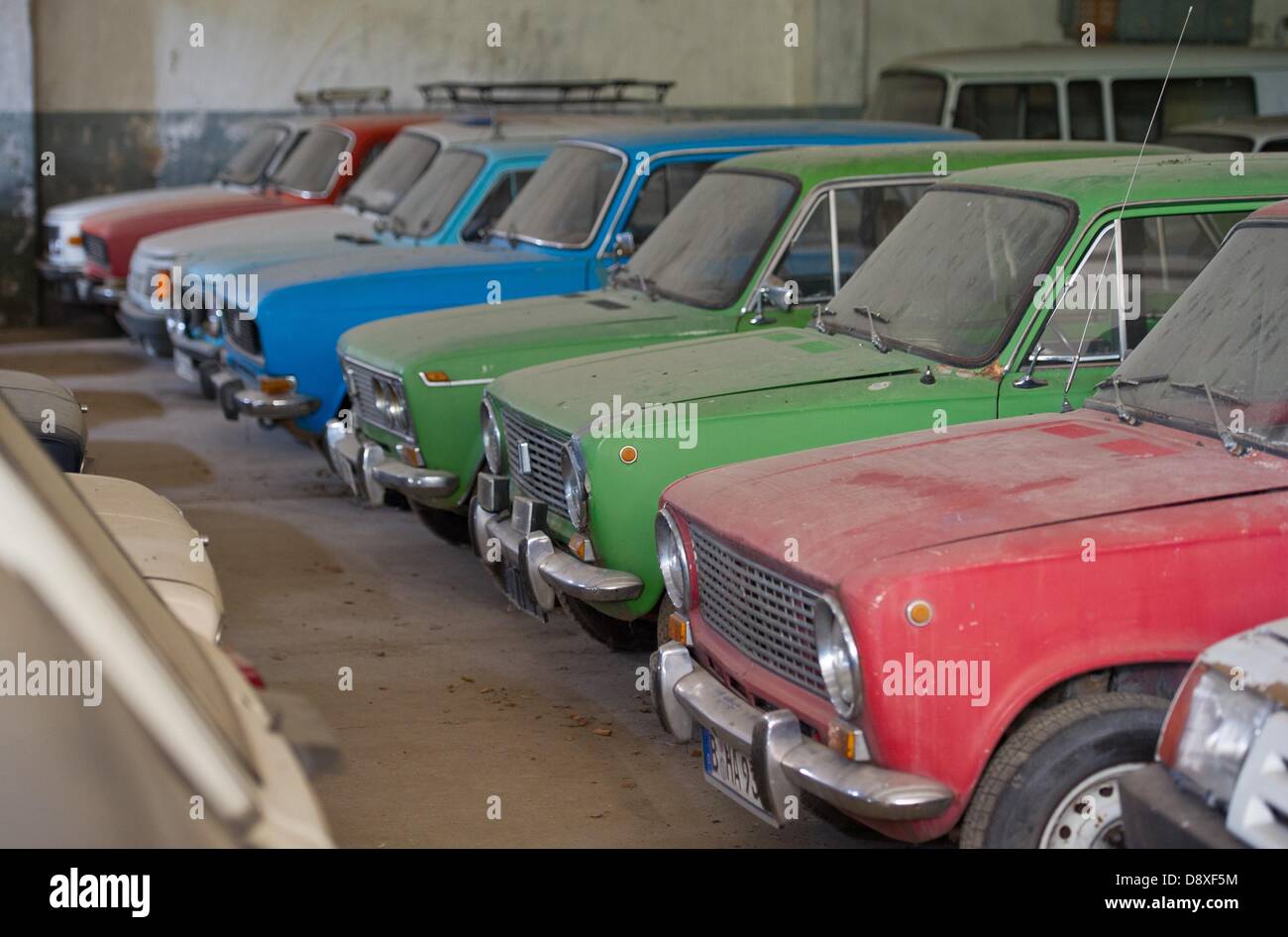 A room full of cars from the Eastern bloc is pictured in the historical vehicle park of the Brunner family in Harnekop, Germany, 19 May 2013. Photo: PATRICK PLEUL Stock Photo