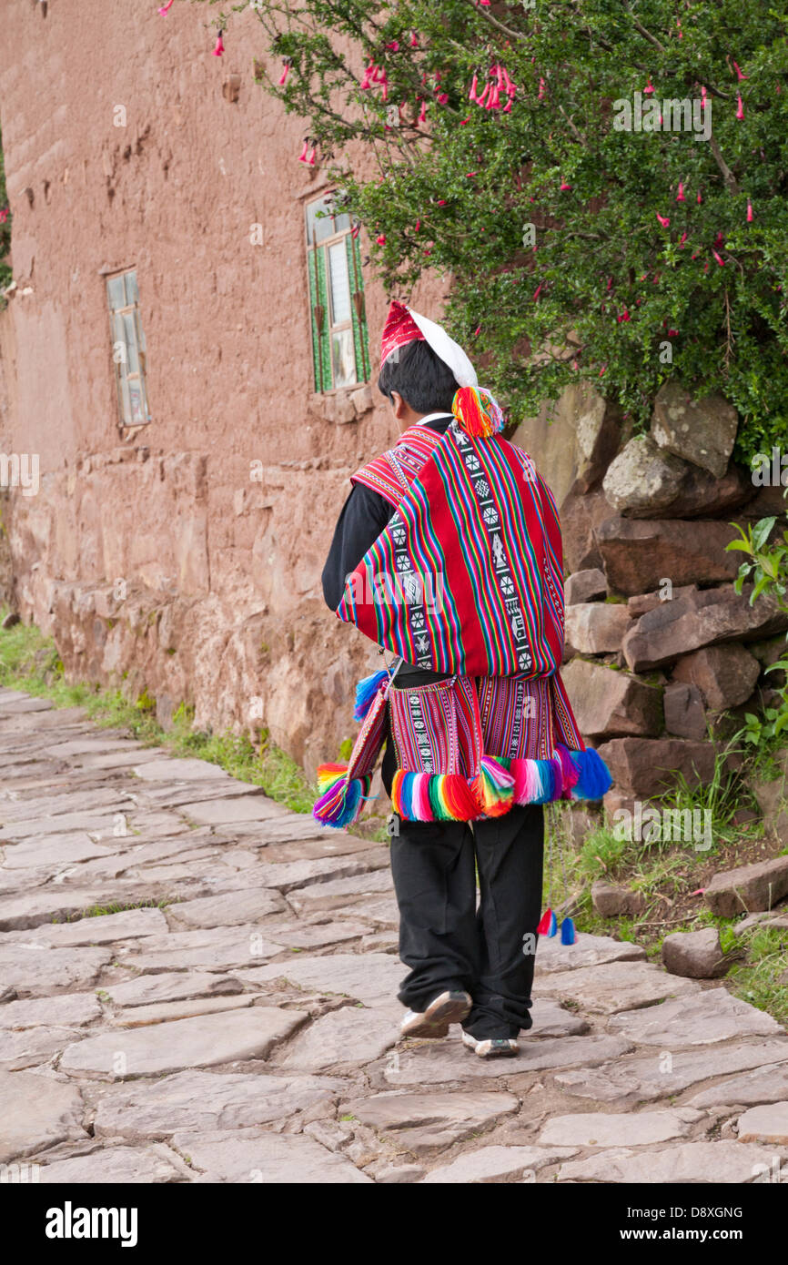 People of Taquile Island wearing traditional clothes, Lake Titicaca, Peru Stock Photo