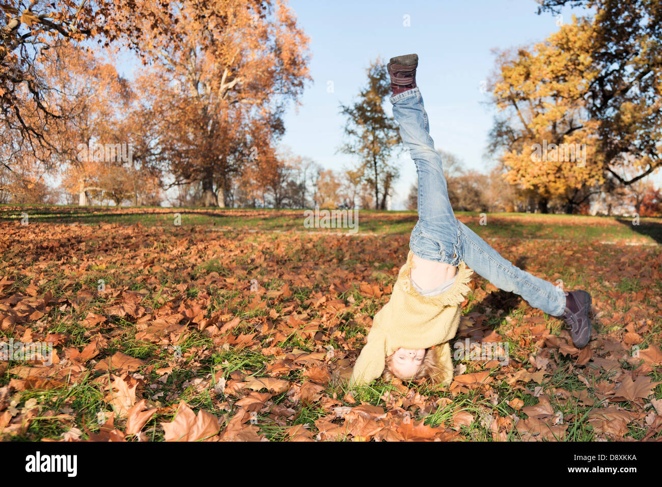 Six year-old girl doing a cartwheel Stock Photo