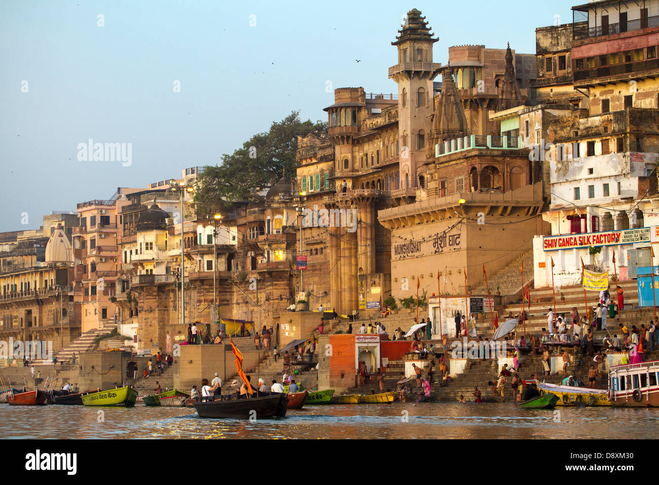 Ghats on the banks of Ganges river in holy city of Varanasi Stock Photo