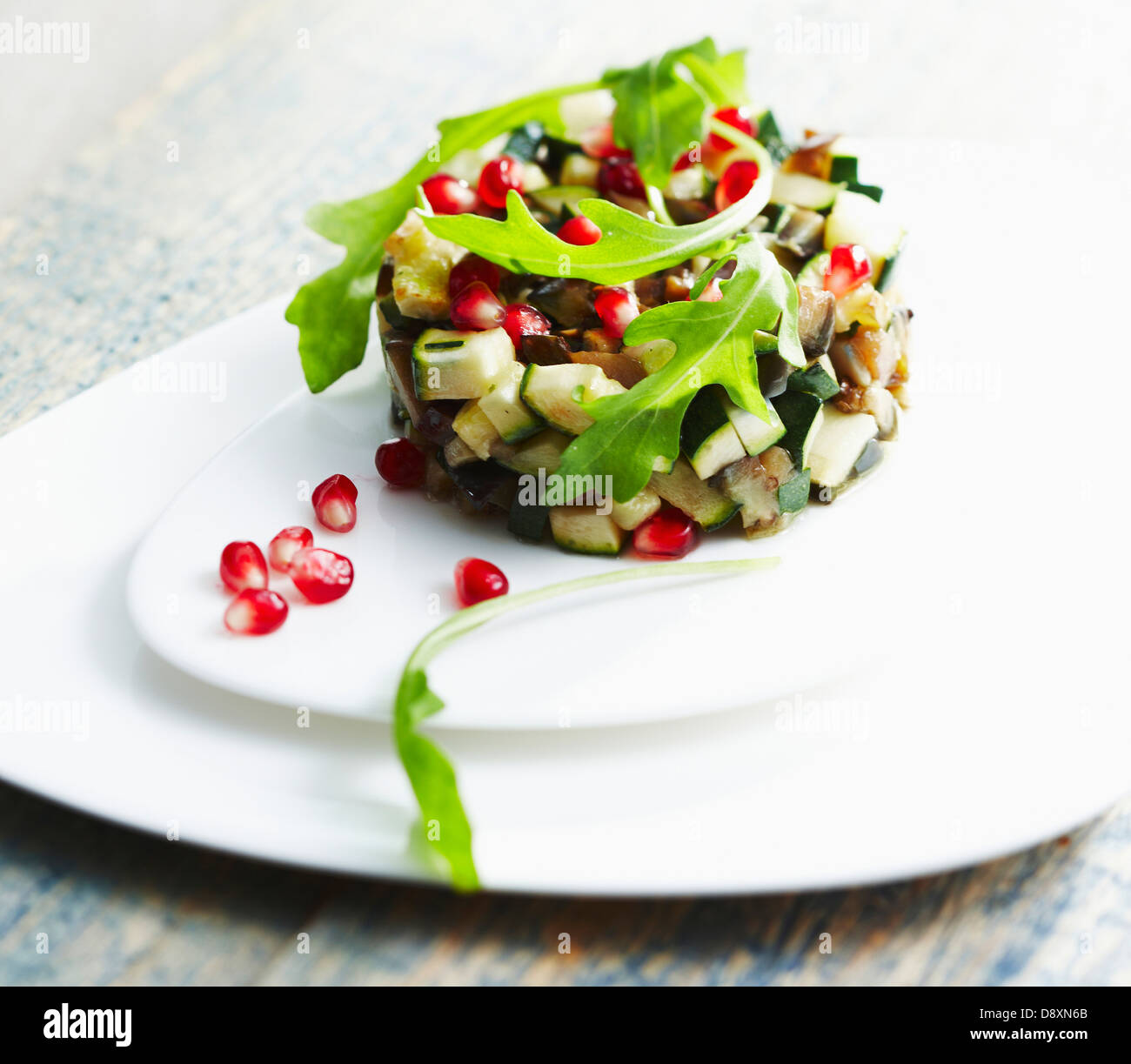 Zucchini,eggplant and pomegranate seed Timbale Stock Photo Alamy