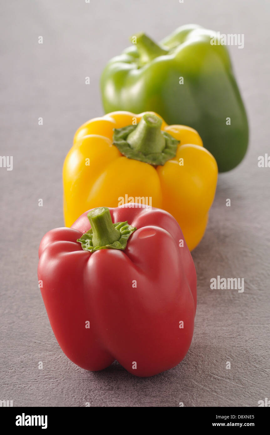 Three different colored bell peppers Stock Photo Alamy