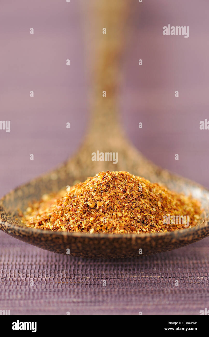 Spoonful of ground Cayenne pepper Stock Photo