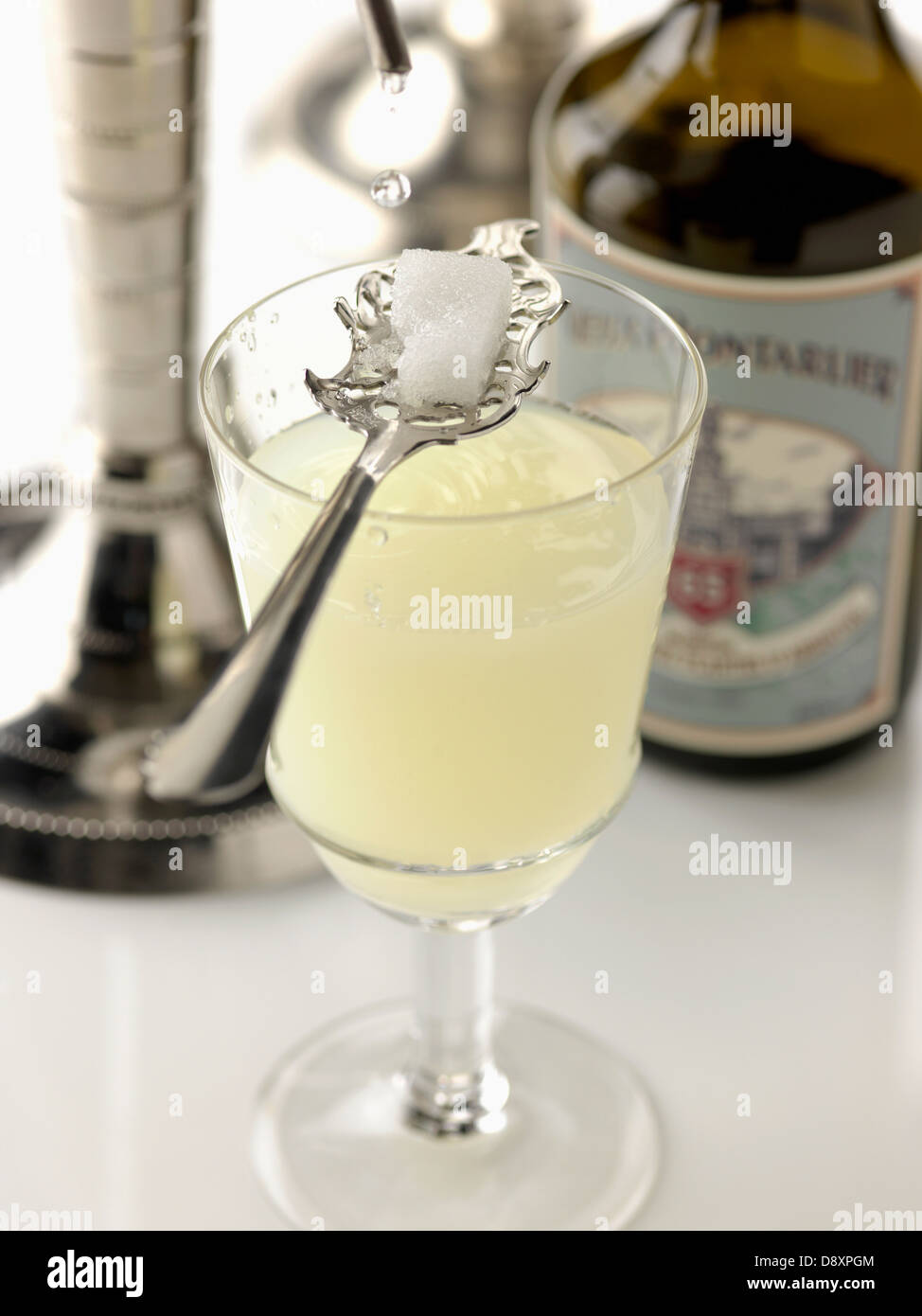 Serving a glass of Absinthe Stock Photo