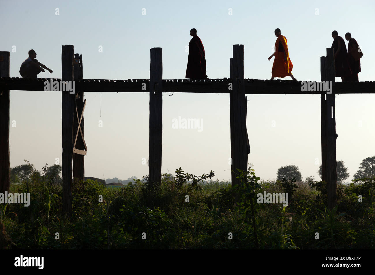 Monks Crossing U Bein Teak Bridge across Taungthaman Lake, Myanmar ...