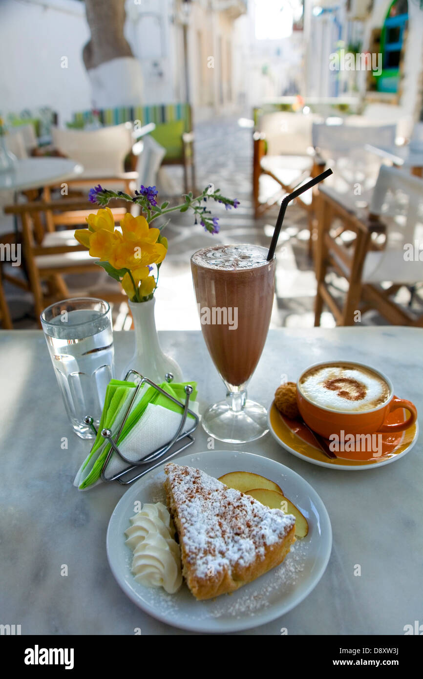 Sugar cake, milk shake and coffee in an outdoor café, Parikia, Paros