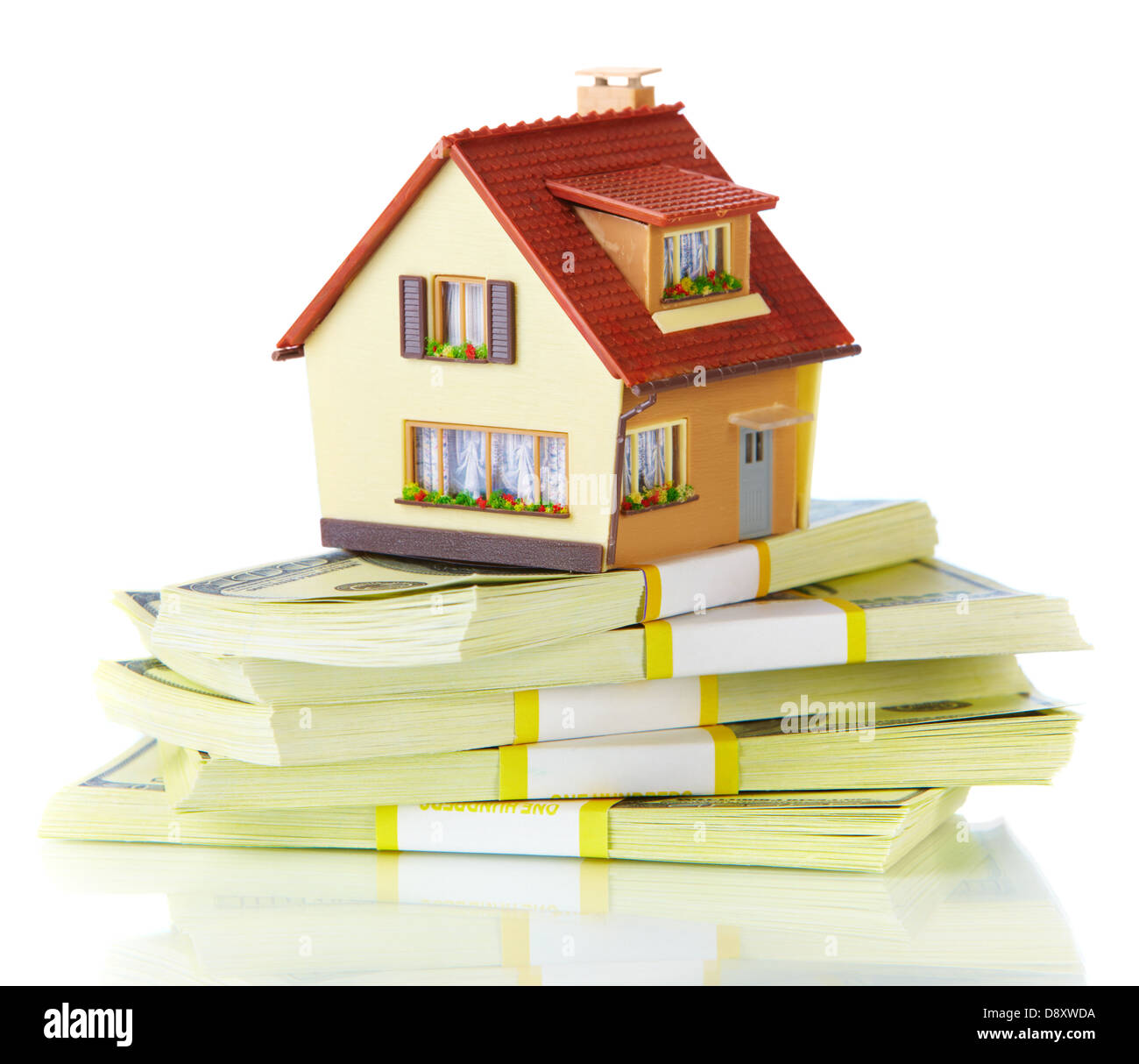 house on packs of banknotes... Stock Photo