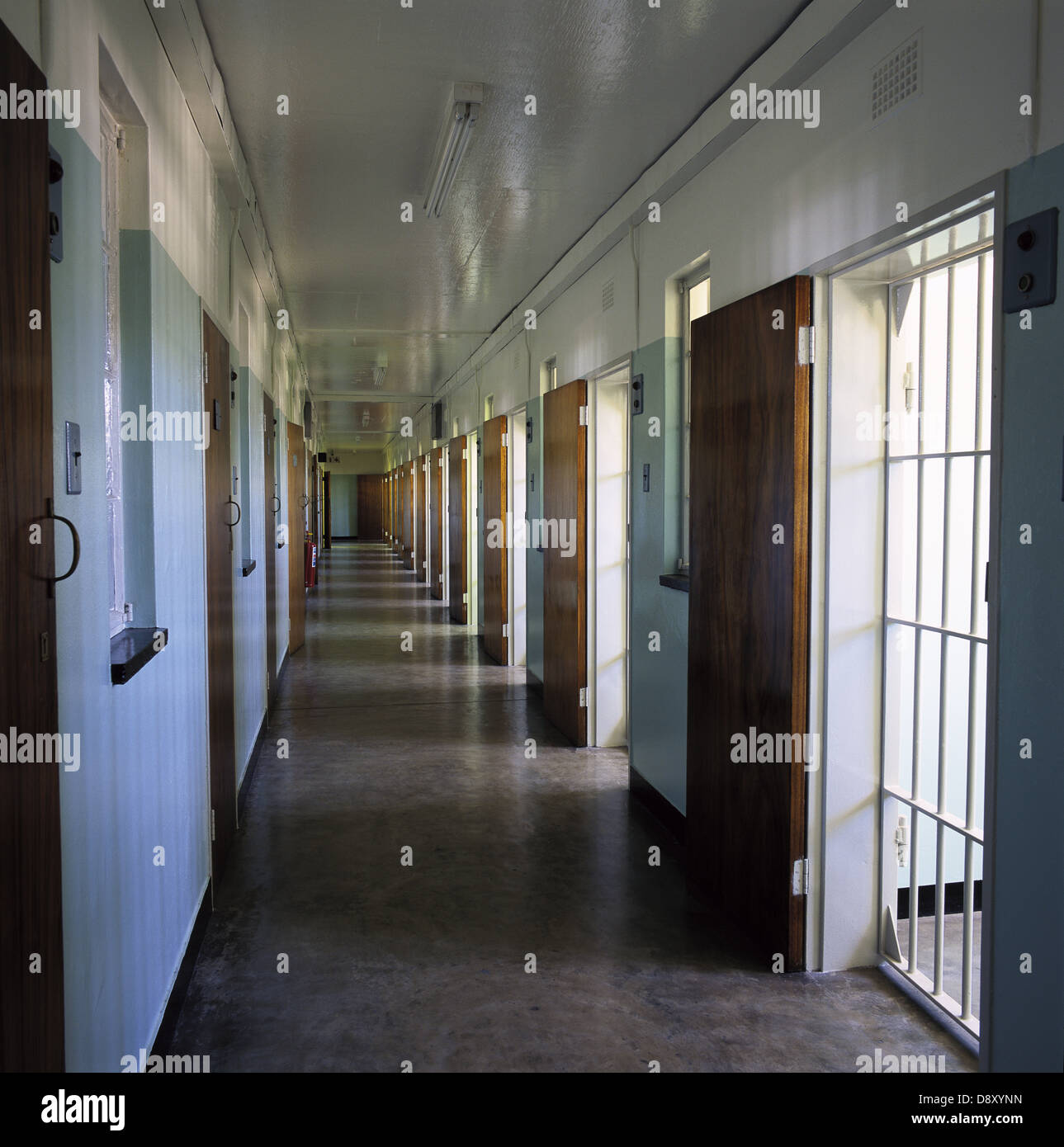 Prison Hallway that contains Nelson Mandela's former cell in the Maximum Security prison at Robben Island Stock Photo