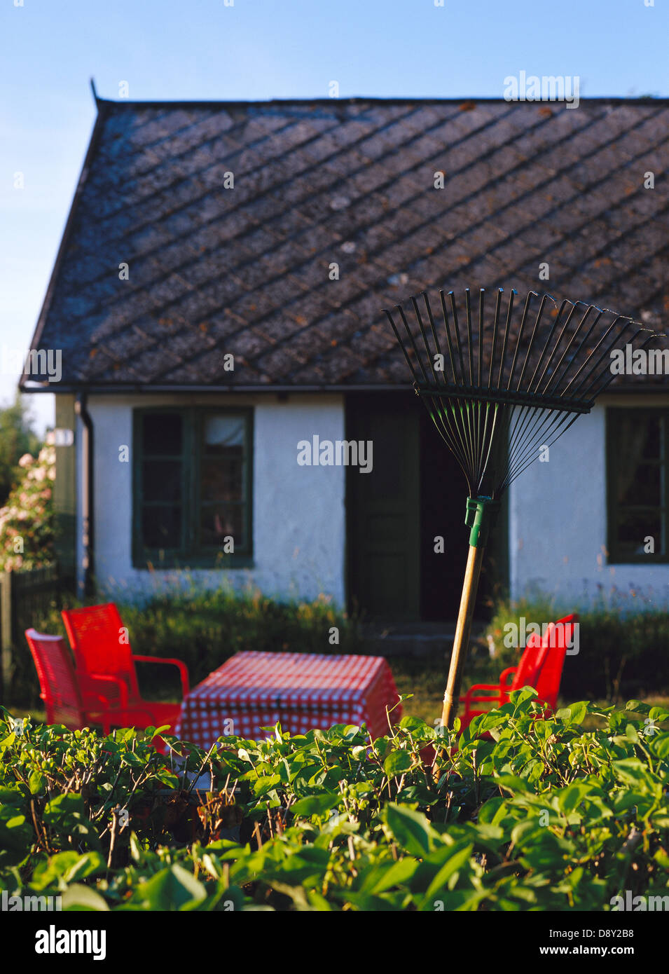 Garden Furniture Outside A Cottage Stock Photo Alamy