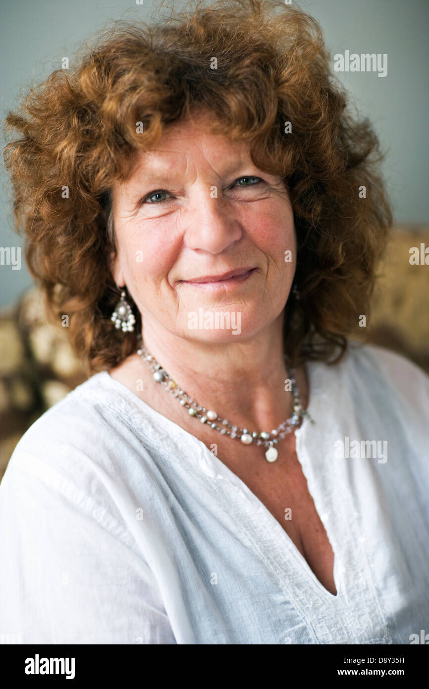 Curly hair woman smiling hi-res stock photography and images - Alamy