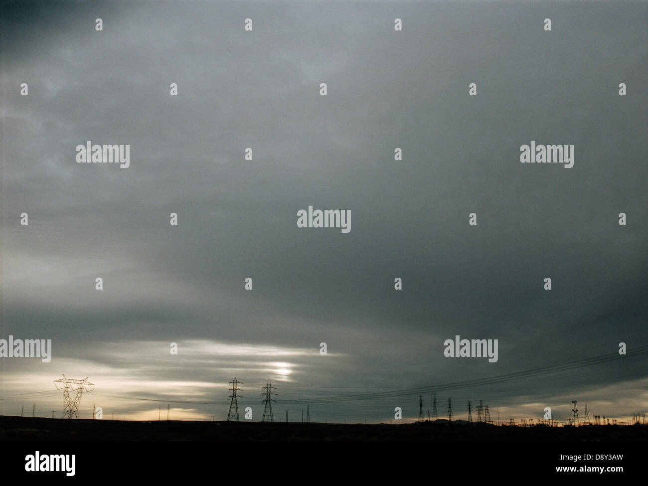 Sky with dark clouds and power lines in the background Stock Photo - Alamy