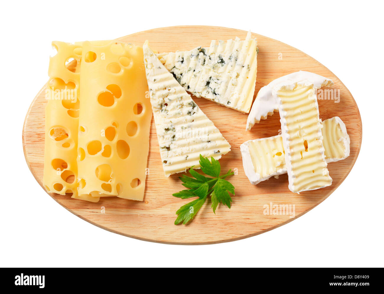 Variety of cheeses on a cutting board Stock Photo