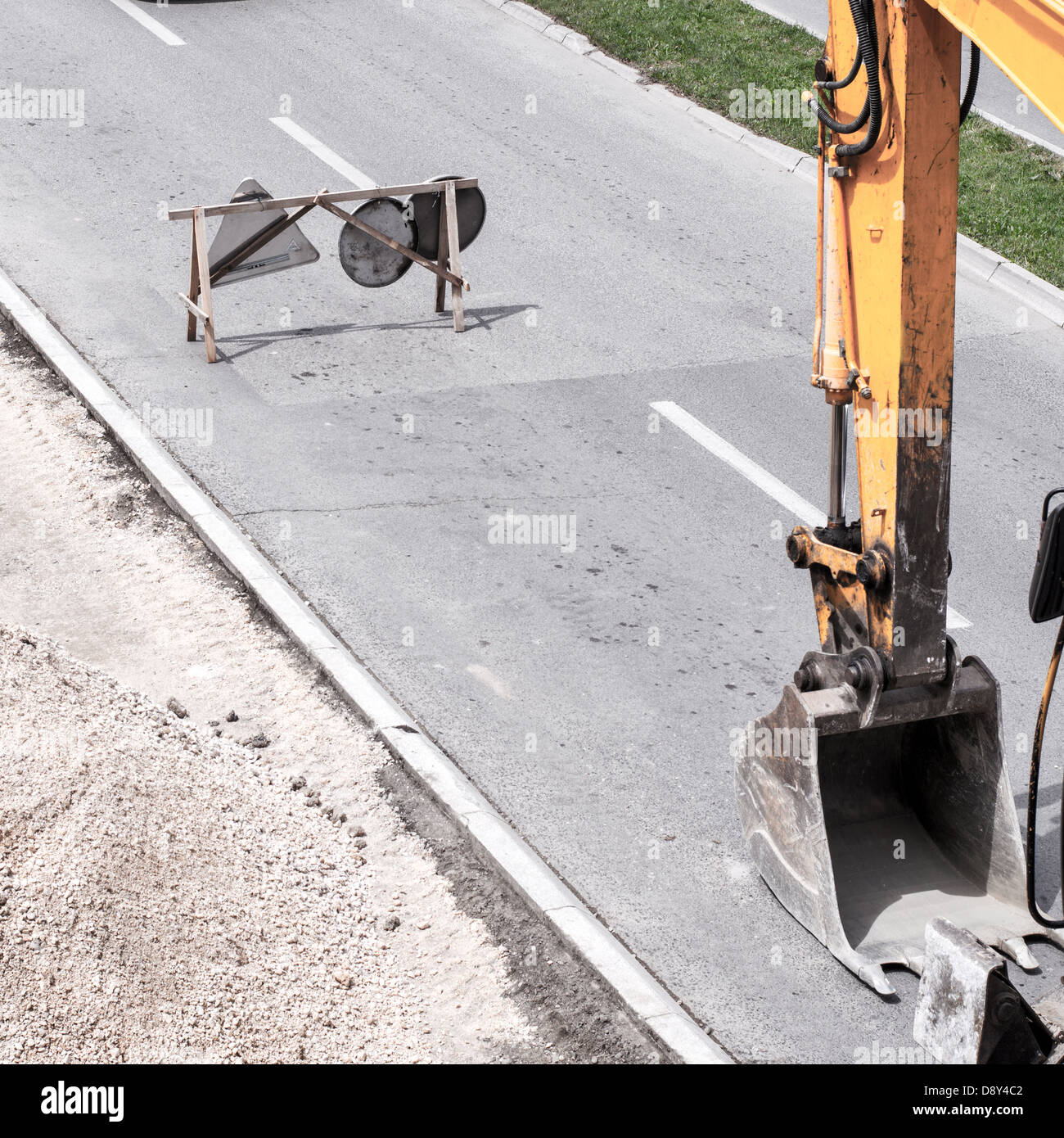 Scoop on a road construction site Stock Photo Alamy