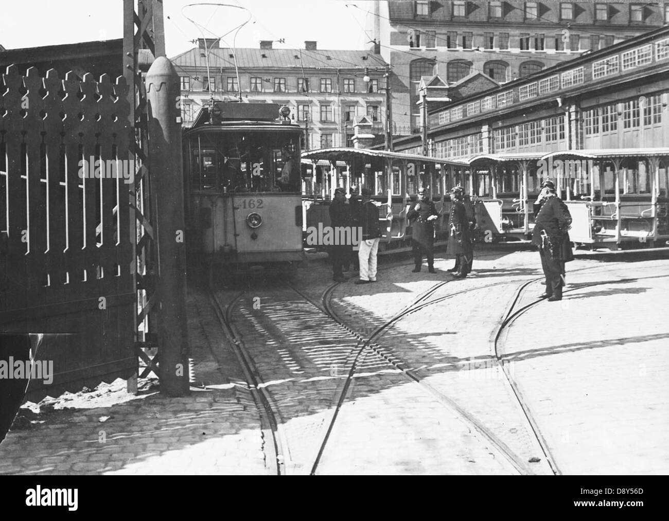 Police guarding strike breakers at tram depot in 1909 Stock Photo
