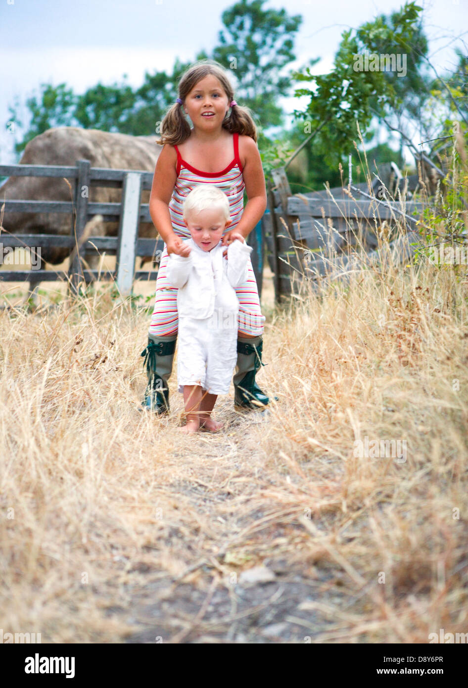 Two girls walking hi-res stock photography and images - Alamy