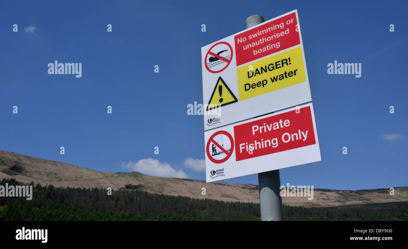 danger notice at dove stone reservoir, greenfield, oldham, uk Stock Photo