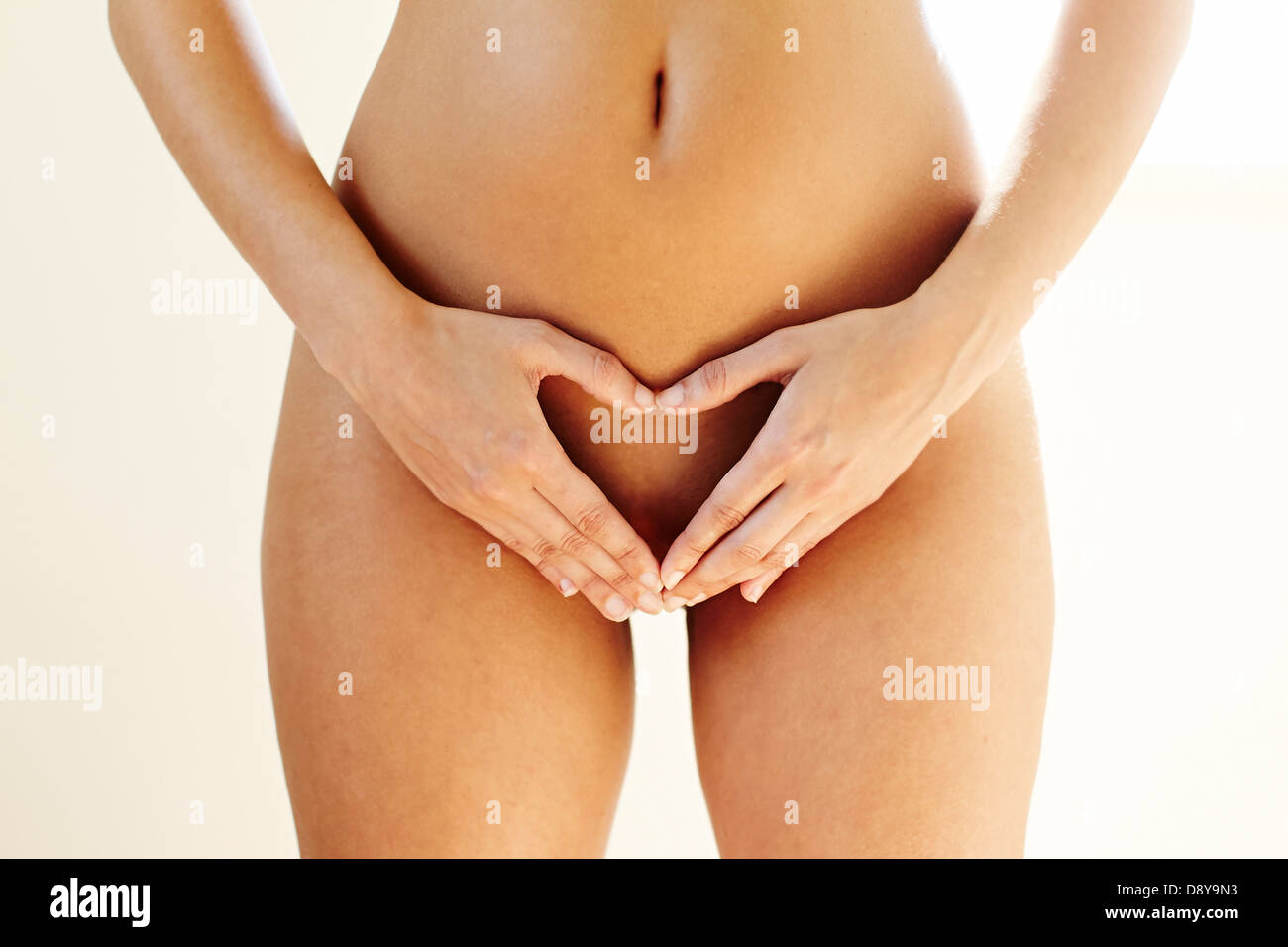 Naked woman abdomen Stock Photo - Alamy