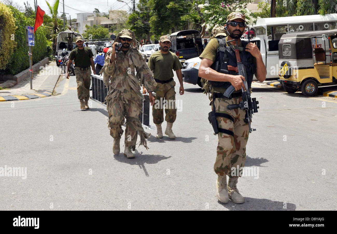 Troops from Pakistan Army, Sindh Rangers, DHA Vigilance Security participated in continuation of the Joint Counter Terrorism exercises held in Defence area of Karachi on Thursday, June 06, 2013. Stock Photo