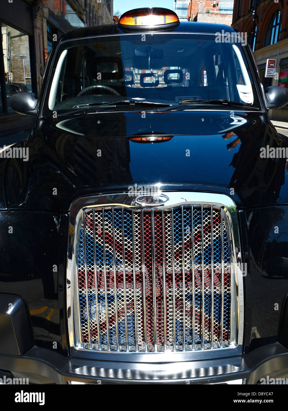Taxi with union jack painted on grill UK Stock Photo - Alamy