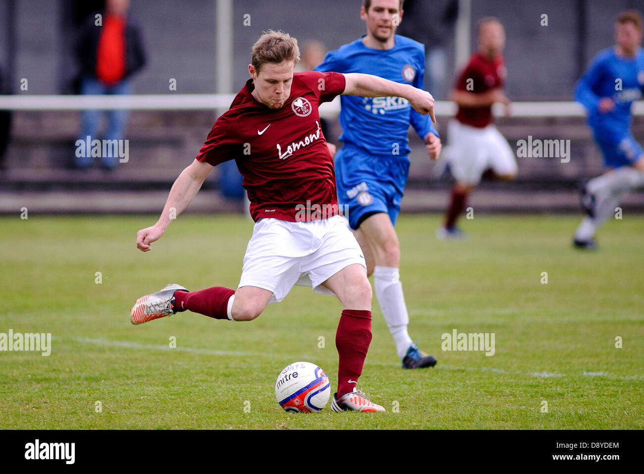 Kelty, Fife, Scotland, UK. 5th June 2013. Darren Smith plays a pass during the East Region Super